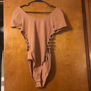 Tan body suit